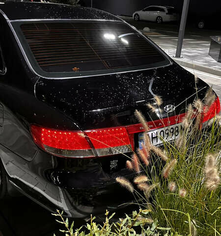 Черный Хендай Грандер, объемом двигателя 3.3 л и пробегом 230 тыс. км за 8500 $, фото 6 на Automoto.ua