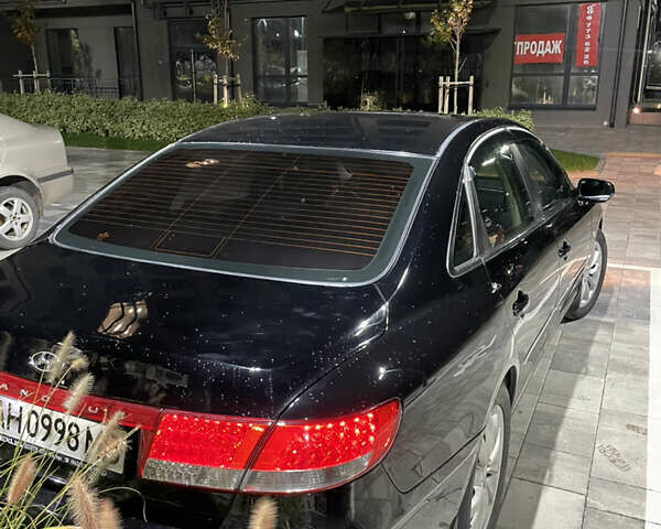 Черный Хендай Грандер, объемом двигателя 3.3 л и пробегом 230 тыс. км за 8500 $, фото 7 на Automoto.ua