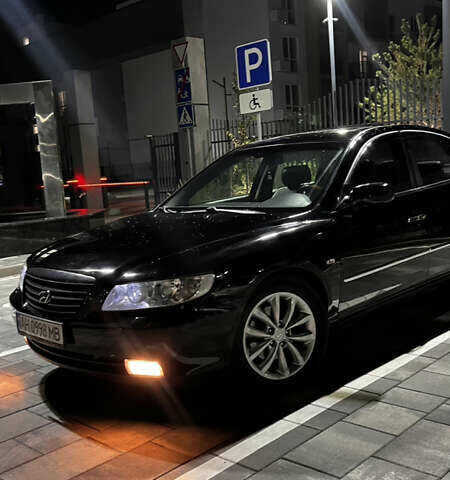 Черный Хендай Грандер, объемом двигателя 3.3 л и пробегом 230 тыс. км за 8500 $, фото 2 на Automoto.ua