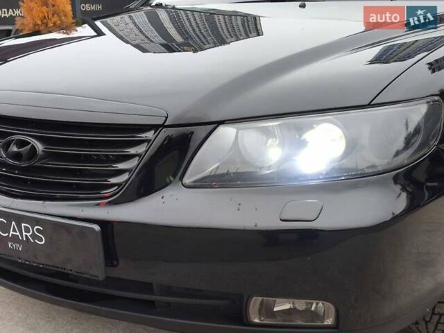 Черный Хендай Грандер, объемом двигателя 3.3 л и пробегом 163 тыс. км за 8500 $, фото 6 на Automoto.ua