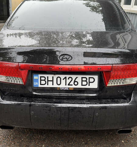 Черный Хендай Грандер, объемом двигателя 3.3 л и пробегом 165 тыс. км за 7990 $, фото 7 на Automoto.ua