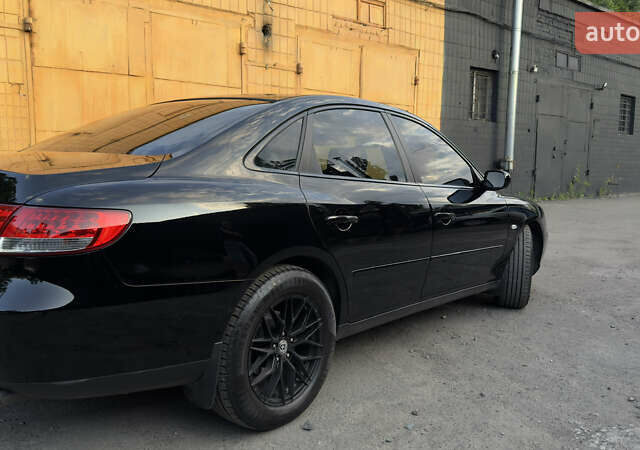 Черный Хендай Грандер, объемом двигателя 3.3 л и пробегом 165 тыс. км за 7990 $, фото 11 на Automoto.ua