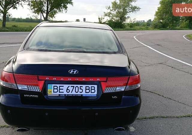 Черный Хендай Грандер, объемом двигателя 3.34 л и пробегом 198 тыс. км за 8500 $, фото 1 на Automoto.ua