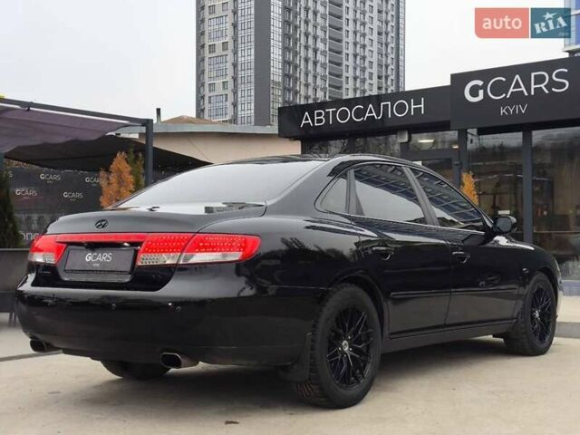 Черный Хендай Грандер, объемом двигателя 3.3 л и пробегом 163 тыс. км за 8500 $, фото 3 на Automoto.ua