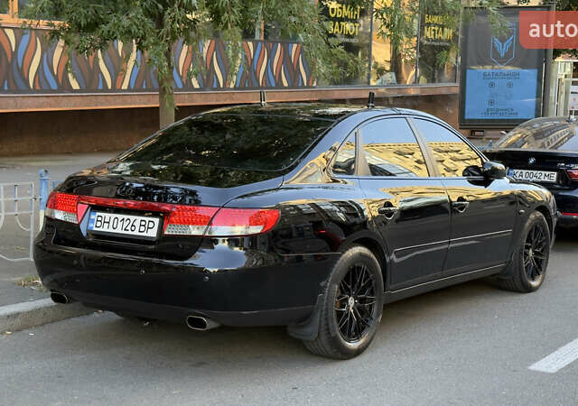 Черный Хендай Грандер, объемом двигателя 3.3 л и пробегом 165 тыс. км за 7990 $, фото 2 на Automoto.ua