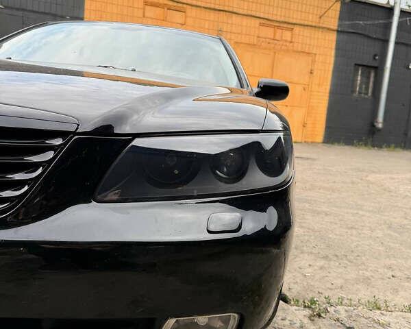 Черный Хендай Грандер, объемом двигателя 3.3 л и пробегом 165 тыс. км за 7990 $, фото 17 на Automoto.ua