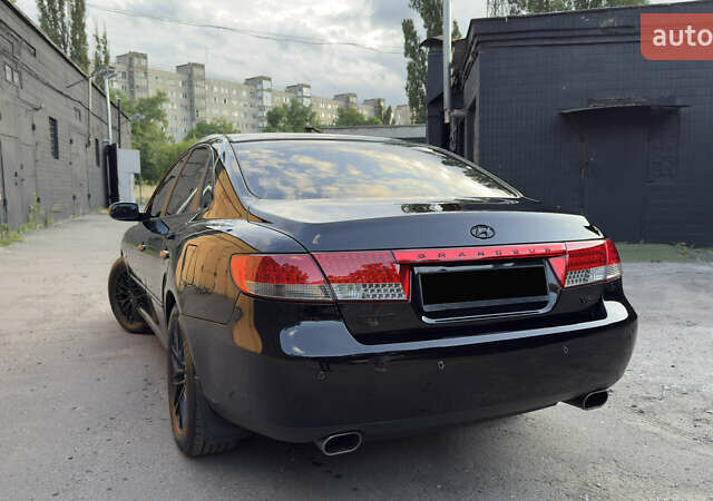 Черный Хендай Грандер, объемом двигателя 3.3 л и пробегом 165 тыс. км за 7990 $, фото 14 на Automoto.ua