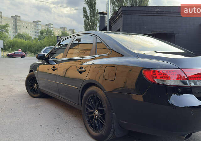 Черный Хендай Грандер, объемом двигателя 3.3 л и пробегом 165 тыс. км за 7990 $, фото 10 на Automoto.ua