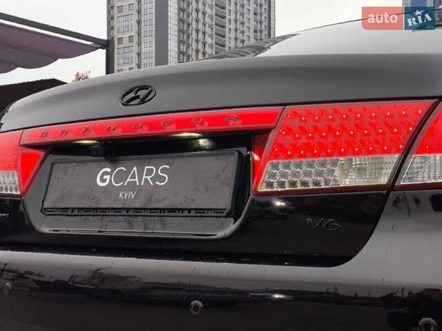 Черный Хендай Грандер, объемом двигателя 3.3 л и пробегом 163 тыс. км за 8500 $, фото 7 на Automoto.ua