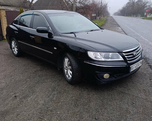 Черный Хендай Грандер, объемом двигателя 3.34 л и пробегом 240 тыс. км за 5500 $, фото 1 на Automoto.ua