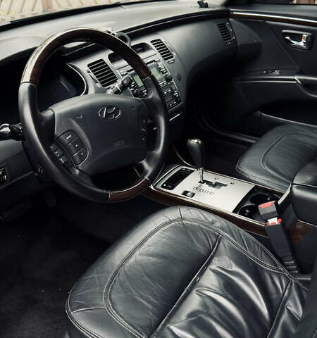 Черный Хендай Грандер, объемом двигателя 3.3 л и пробегом 165 тыс. км за 7990 $, фото 4 на Automoto.ua