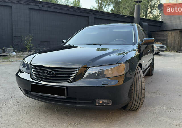 Черный Хендай Грандер, объемом двигателя 3.3 л и пробегом 165 тыс. км за 7990 $, фото 9 на Automoto.ua