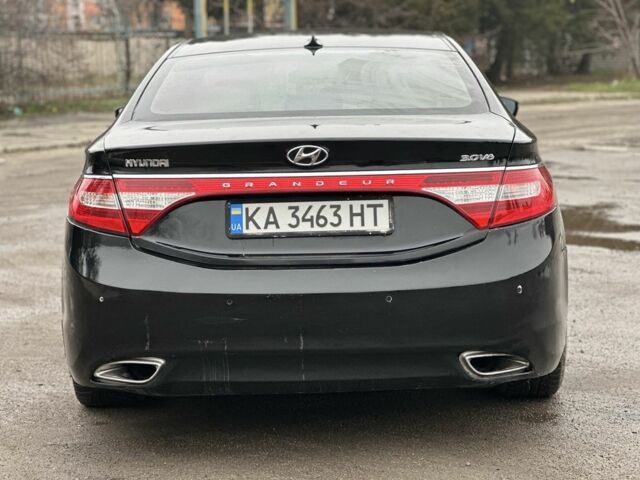 Чорний Хендай Грандер, об'ємом двигуна 3 л та пробігом 260 тис. км за 7777 $, фото 2 на Automoto.ua