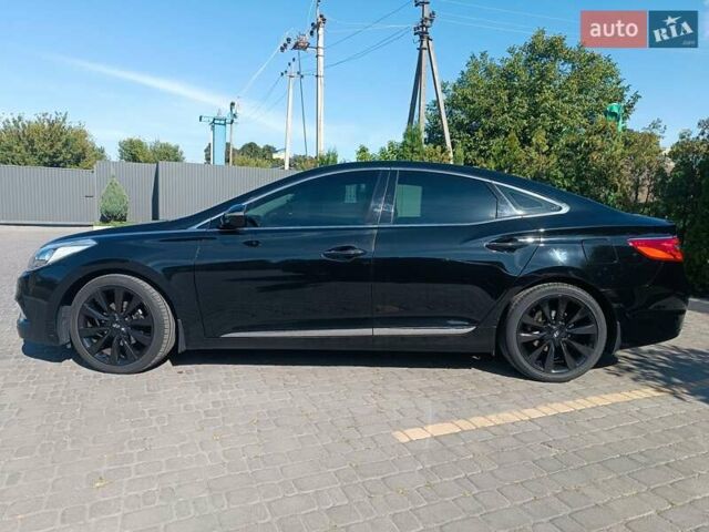 Чорний Хендай Грандер, об'ємом двигуна 3 л та пробігом 170 тис. км за 12500 $, фото 7 на Automoto.ua