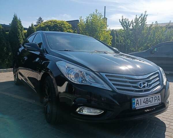 Чорний Хендай Грандер, об'ємом двигуна 3 л та пробігом 170 тис. км за 12500 $, фото 3 на Automoto.ua