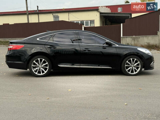 Черный Хендай Грандер, объемом двигателя 2.2 л и пробегом 315 тыс. км за 13300 $, фото 12 на Automoto.ua