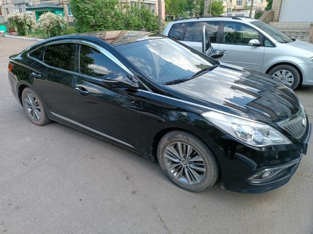 Черный Хендай Грандер, объемом двигателя 3 л и пробегом 82 тыс. км за 13500 $, фото 1 на Automoto.ua