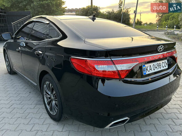 Черный Хендай Грандер, объемом двигателя 2.4 л и пробегом 160 тыс. км за 13500 $, фото 17 на Automoto.ua