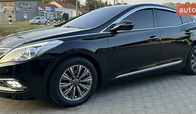 Черный Хендай Грандер, объемом двигателя 2.4 л и пробегом 160 тыс. км за 13500 $, фото 4 на Automoto.ua