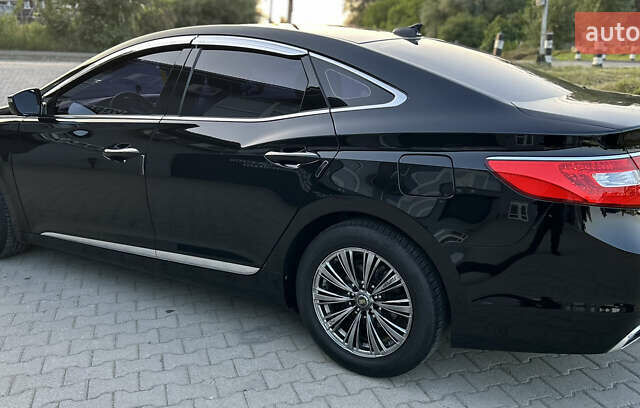 Черный Хендай Грандер, объемом двигателя 2.4 л и пробегом 160 тыс. км за 13500 $, фото 18 на Automoto.ua