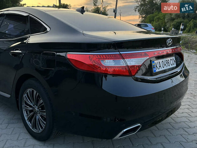 Черный Хендай Грандер, объемом двигателя 2.4 л и пробегом 160 тыс. км за 13500 $, фото 9 на Automoto.ua