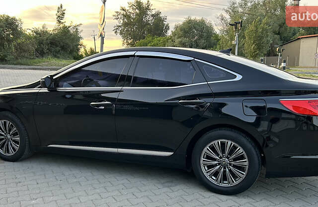 Черный Хендай Грандер, объемом двигателя 2.4 л и пробегом 160 тыс. км за 13500 $, фото 6 на Automoto.ua