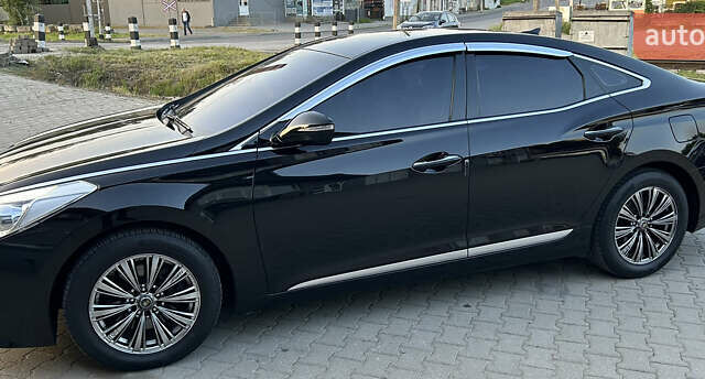 Черный Хендай Грандер, объемом двигателя 2.4 л и пробегом 160 тыс. км за 13500 $, фото 15 на Automoto.ua