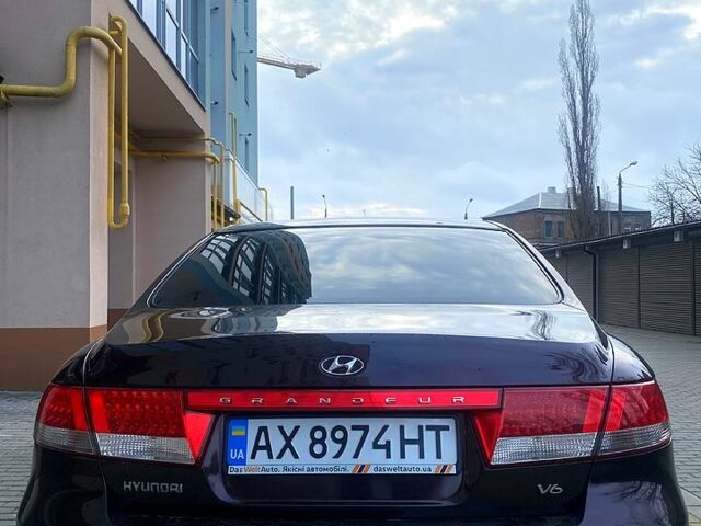 Коричневый Хендай Грандер, объемом двигателя 3.3 л и пробегом 305 тыс. км за 5300 $, фото 4 на Automoto.ua