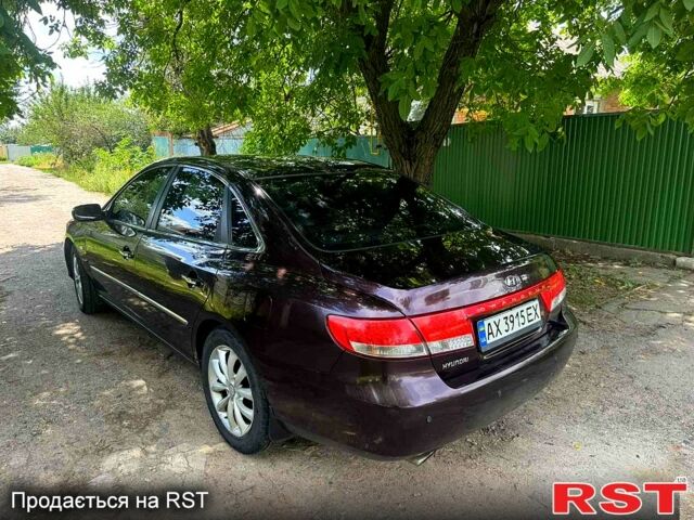 Коричневый Хендай Грандер, объемом двигателя 3.3 л и пробегом 275 тыс. км за 5500 $, фото 6 на Automoto.ua