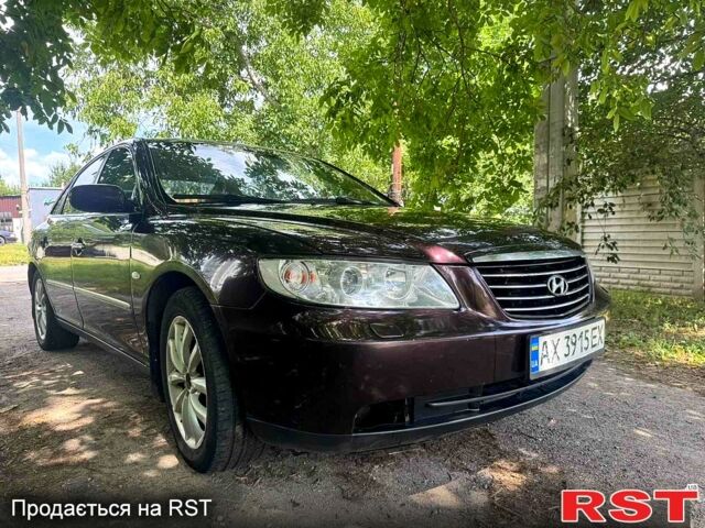 Коричневый Хендай Грандер, объемом двигателя 3.3 л и пробегом 275 тыс. км за 5500 $, фото 1 на Automoto.ua