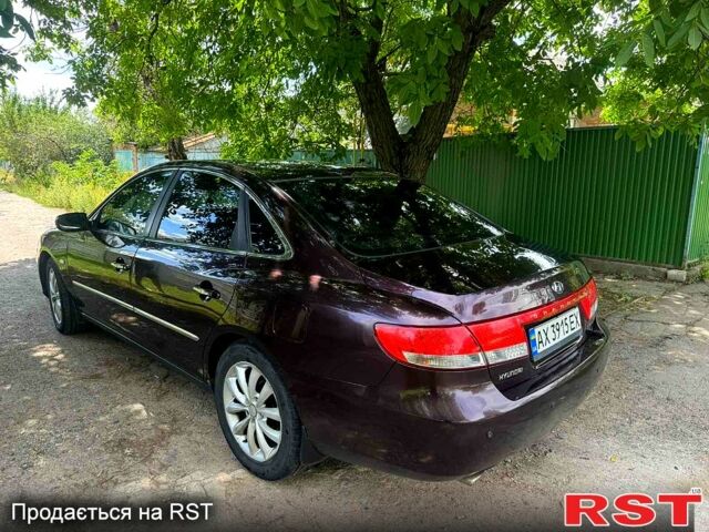 Коричневый Хендай Грандер, объемом двигателя 3.3 л и пробегом 275 тыс. км за 5500 $, фото 5 на Automoto.ua