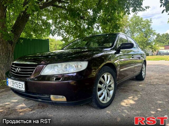 Коричневый Хендай Грандер, объемом двигателя 3.3 л и пробегом 275 тыс. км за 5500 $, фото 3 на Automoto.ua
