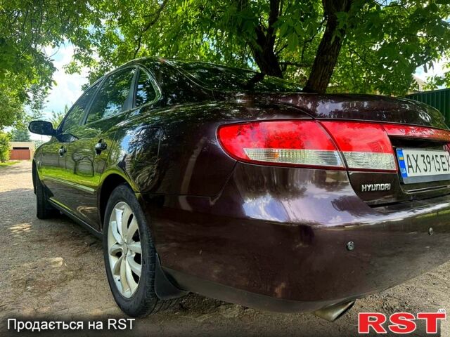 Коричневый Хендай Грандер, объемом двигателя 3.3 л и пробегом 275 тыс. км за 5500 $, фото 4 на Automoto.ua