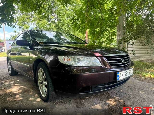 Коричневый Хендай Грандер, объемом двигателя 3.3 л и пробегом 275 тыс. км за 5500 $, фото 2 на Automoto.ua