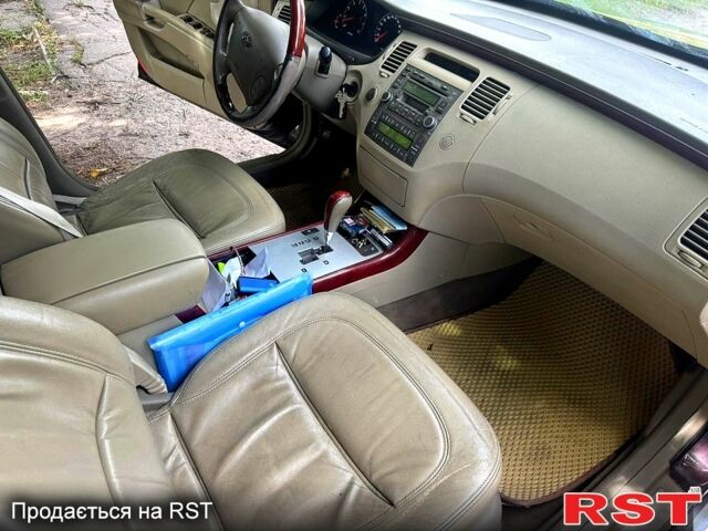 Коричневый Хендай Грандер, объемом двигателя 3.3 л и пробегом 275 тыс. км за 5500 $, фото 12 на Automoto.ua