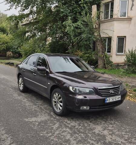 Красный Хендай Грандер, объемом двигателя 3.34 л и пробегом 243 тыс. км за 4000 $, фото 6 на Automoto.ua