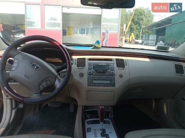 Красный Хендай Грандер, объемом двигателя 3.34 л и пробегом 243 тыс. км за 3500 $, фото 1 на Automoto.ua