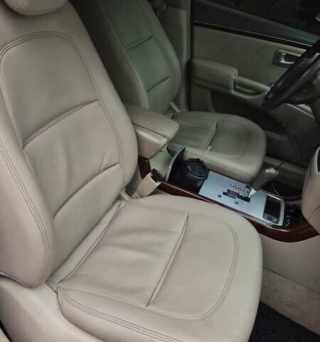 Красный Хендай Грандер, объемом двигателя 3.34 л и пробегом 243 тыс. км за 4000 $, фото 2 на Automoto.ua