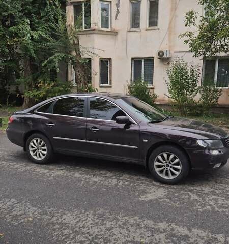 Красный Хендай Грандер, объемом двигателя 3.34 л и пробегом 243 тыс. км за 4000 $, фото 4 на Automoto.ua