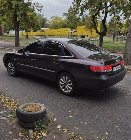 Красный Хендай Грандер, объемом двигателя 3.34 л и пробегом 243 тыс. км за 4000 $, фото 5 на Automoto.ua