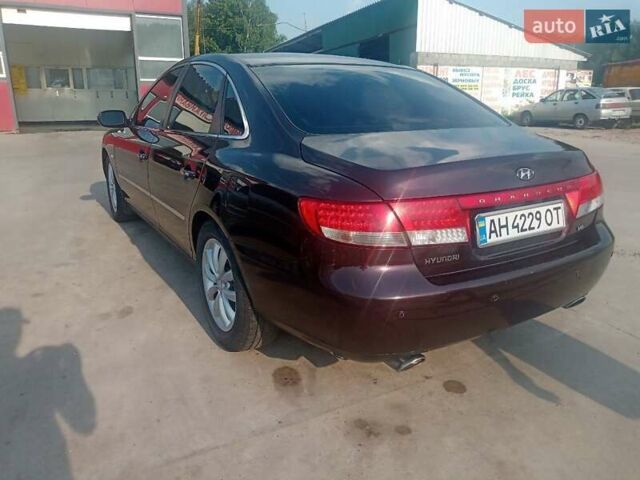 Красный Хендай Грандер, объемом двигателя 3.34 л и пробегом 243 тыс. км за 3500 $, фото 3 на Automoto.ua