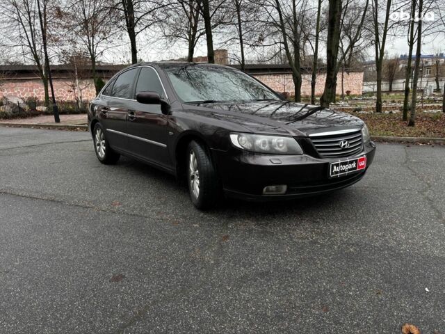 Червоний Хендай Грандер, об'ємом двигуна 3.3 л та пробігом 246 тис. км за 7490 $, фото 2 на Automoto.ua