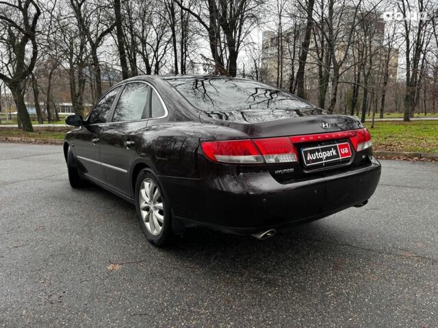 Червоний Хендай Грандер, об'ємом двигуна 3.3 л та пробігом 246 тис. км за 7490 $, фото 4 на Automoto.ua