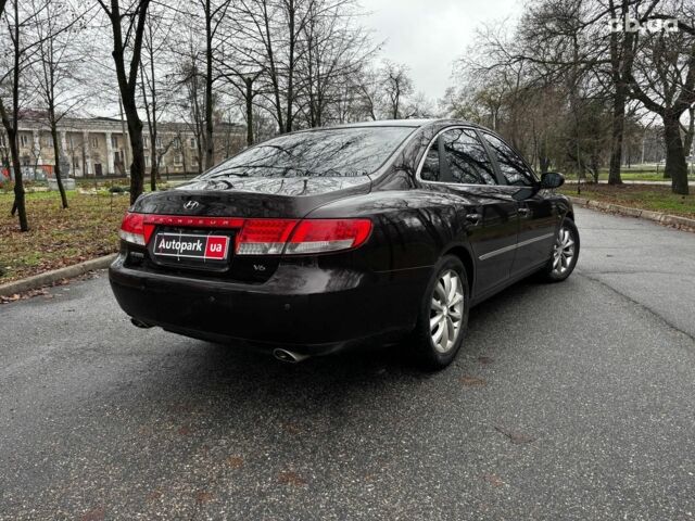 Червоний Хендай Грандер, об'ємом двигуна 3.3 л та пробігом 246 тис. км за 7490 $, фото 6 на Automoto.ua