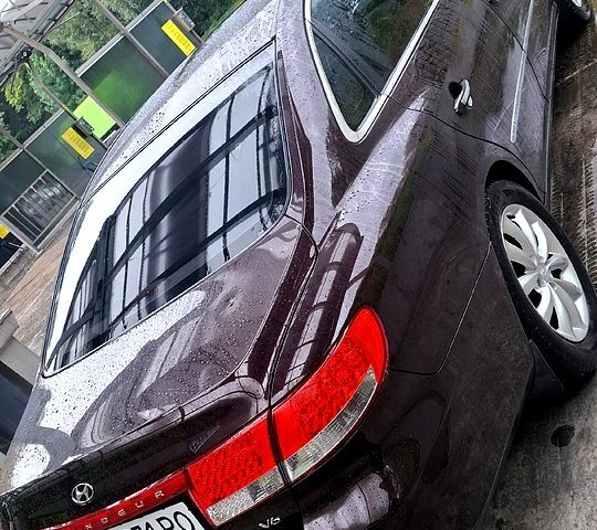 Червоний Хендай Грандер, об'ємом двигуна 3.3 л та пробігом 280 тис. км за 6500 $, фото 8 на Automoto.ua