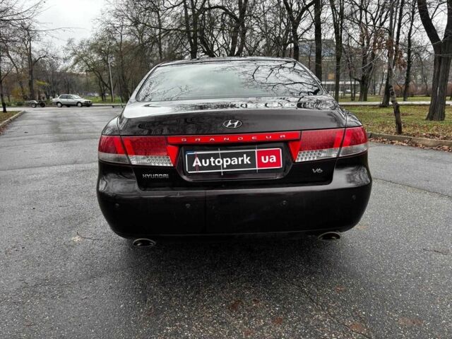 Красный Хендай Грандер, объемом двигателя 3.3 л и пробегом 246 тыс. км за 5990 $, фото 3 на Automoto.ua