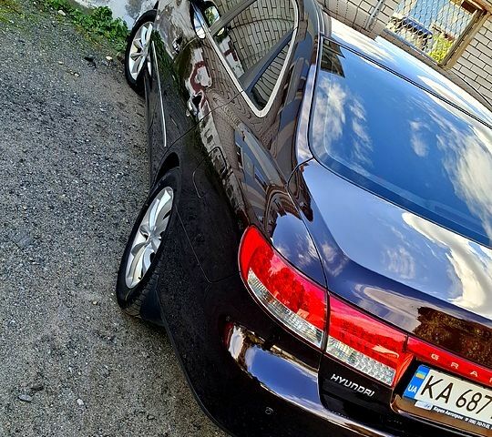 Червоний Хендай Грандер, об'ємом двигуна 3.3 л та пробігом 280 тис. км за 6500 $, фото 3 на Automoto.ua