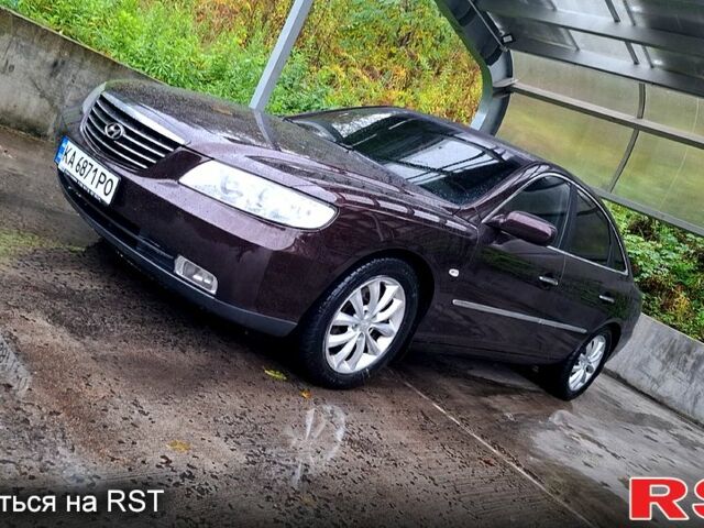 Червоний Хендай Грандер, об'ємом двигуна 3.3 л та пробігом 280 тис. км за 6500 $, фото 7 на Automoto.ua