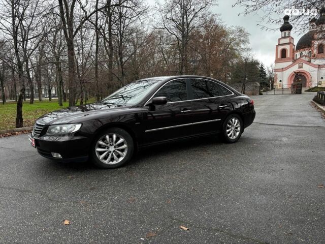 Червоний Хендай Грандер, об'ємом двигуна 3.3 л та пробігом 246 тис. км за 7490 $, фото 3 на Automoto.ua