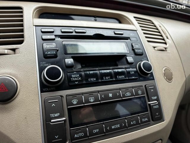 Червоний Хендай Грандер, об'ємом двигуна 3.3 л та пробігом 246 тис. км за 7490 $, фото 21 на Automoto.ua